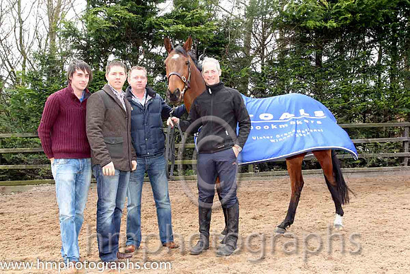 Colm McDonnell, with brothers Conor & Chris, owner of Hidden Horizons winner of the Toals bookmakers Ulster Grand National at Downpatrick. Trainer Stuart Crawford is right of picture - CU2D1405-Edit-5