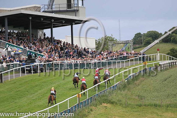 Race 3 Winner Hurricane Georgie ridden by Corey McGiven - coulours black, mauve panel number 1