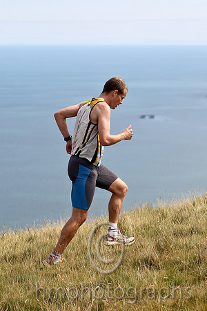 Joe McAlister of St Malachy's on the summit of Lurig, 1st in 28.50 - FT8E3256-e