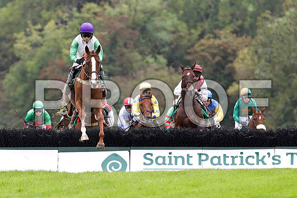 Miss Macauley ( Purple Cap) , Jockey Mr B T O'Connell - 13th in the lead - Lets Go sunshine , Jockey Mr B O'Neill - winner in centre in Yellow and Blue Spots- FT8E4045-e