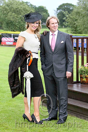 Claudine Quinn from Newry - winner of the Best Dressed Competition & Mike Todd Manager of Down Royal - FT8E5767-e2