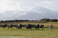 The start of Race 1 at Tyrella with the snow covered Mourne Mountains as a backdrop