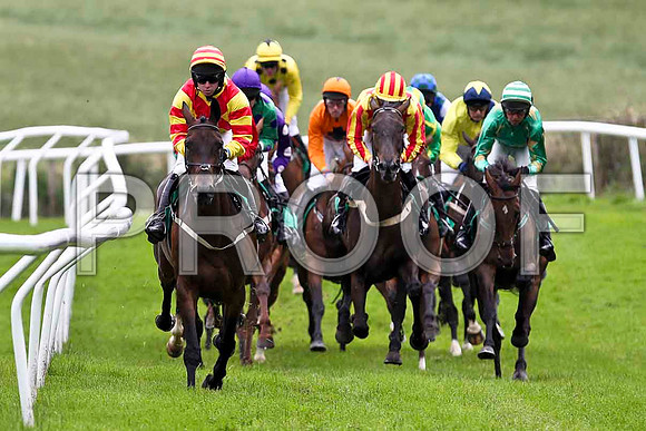 Tear Drops in the lead, finished 4th, Jockey Mr J P McKeown, winner Stigh Collain 3rd from right partially hidden green yellow seams , Jockey Miss N Carberry - FT8E1780-e