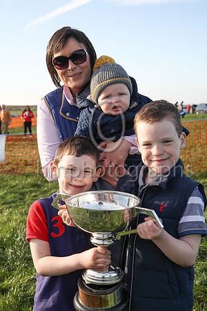 Laura McAleese, owner of Rossamilan winner of the Macauley Wray LLP Maiden Race for 6-Y-O and Upwards Geldings and Novice Riders at the Route P2P at Portrush , wife of trainer Paul McAleese and child