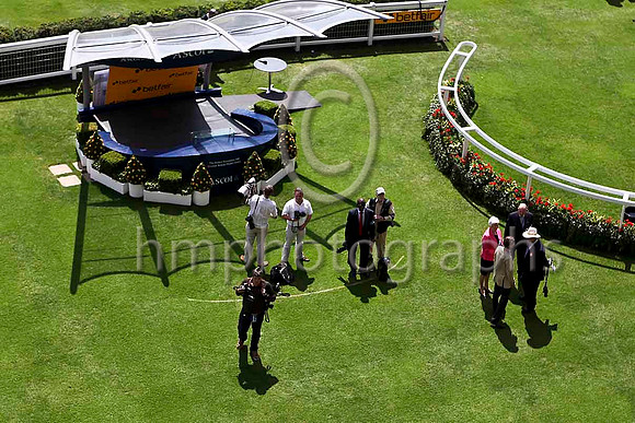 Photographers including Edward Witaker of the Racing Post waiting for the jockeys to emerge into the parage ring at Ascot -IMG_9830-e