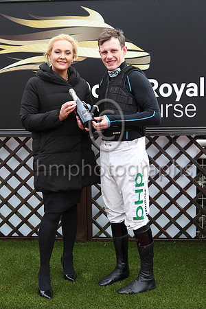 Emma Meehan , Manager of Dowm Royal presenting a bottle of champagne to Gold Cup winning jockey Paul Townend at Down Royal