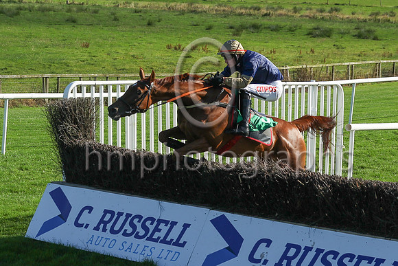 Shantou Sisu and Danny Mullins (dark blue, orange sleeves) winners of Race 6 The Downpatrick Handicap Steeplechase