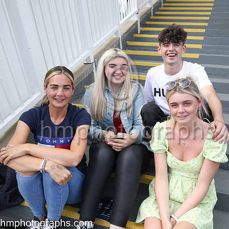 Laura, Rhea and Faith Fitzpatrick with Conor Lundy at The Family Fun Raceday at Downpatrick Race Course on Wednesday 13th July 2022.