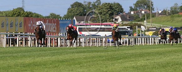 01st Dancila (3 white, purple panel ) Jockey: Kevin Manning , Trainer: J S Bolger