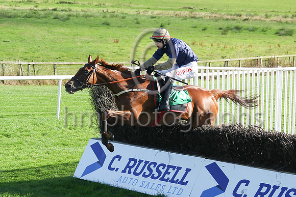Shantou Sisu and Danny Mullins (dark blue, orange sleeves) winners of Race 6 The Downpatrick Handicap Steeplechase