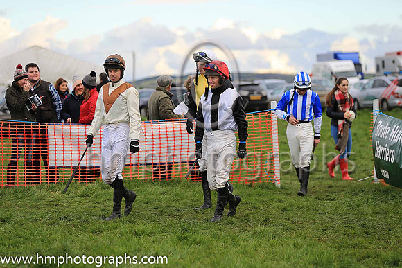 Jockeys enter the parade ring at the Route Point-To-Point Steeplechases at Portsush