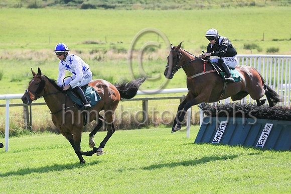 King Kal and Brian Hayes in second place before going on to win Race 1