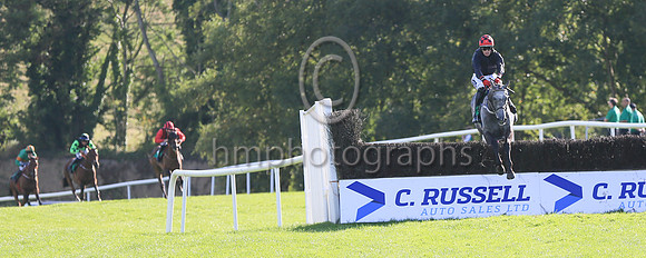 Dollar Value (2, black, black and red check cap) winners of Race 7 The DH Handicap Steeplechase.