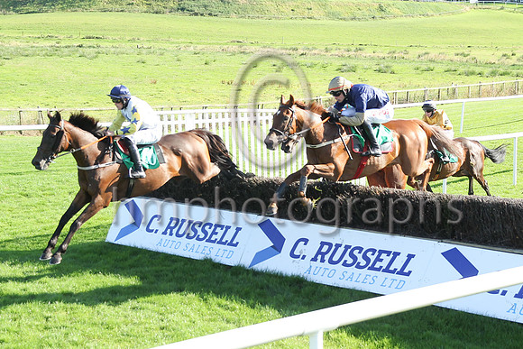 Shantou Sisu and Danny Mullins (dark blue, orange sleeves) winners of Race 6 The Downpatrick Handicap Steeplechase