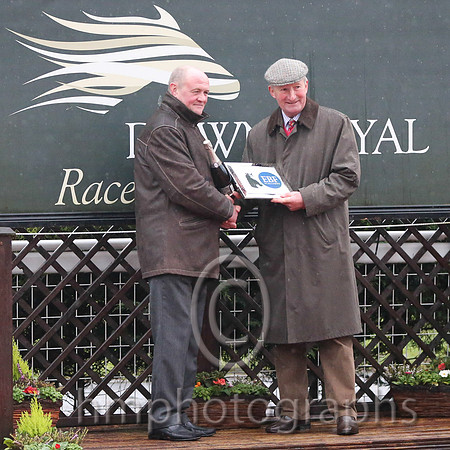 R4 C A McBratney trainer of winner Killultagh Sarah received his prize