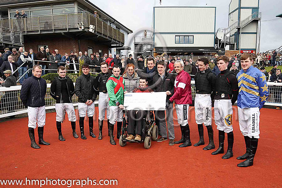 Presentation by Jonjo Bright, Reah Magee and Robert Carlise of East Antrim Hunt  to the Irish Injured Jockeys Fund at  Down Royal.