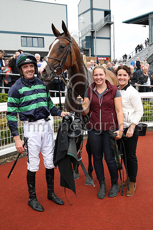 1st Minnie Dahill and R Walsh ( 10 , dark blue and emerald green hoops ) Trainer - T M Walsh , Owner - Micheal D Ryan