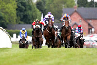 R7 - Slade (White & Purple Hoops) Rider P J Smullen and Rockymountainhigh (Royal Blue Orange Disc) Rider Johnny Murtagh battle it out. Rochymountainhigh won the race- FT8E0600-e