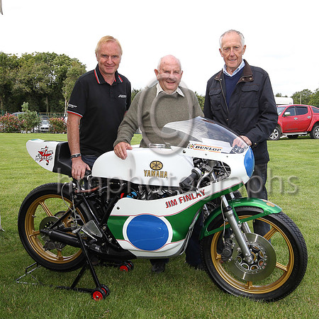 Brian Reid, Ian McGregor and Ray McCullough of Dromara Destroyers fame at Downpatrick Races with the late Tom Herron's motorcycle.
