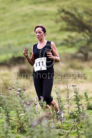 Claire McAlister , 130th overall, 9th woman in 48.54 - FT8E3510-e