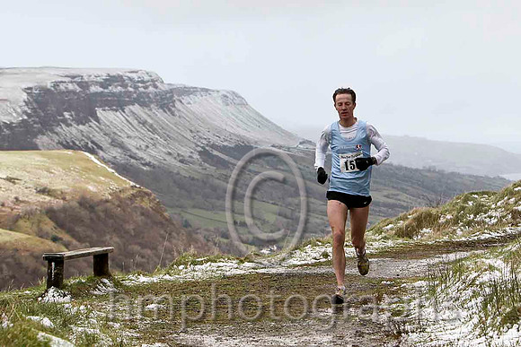 Gregory Walsh - North Belfast Harriers , 3rd in 35.58 -  FT8E8064-e