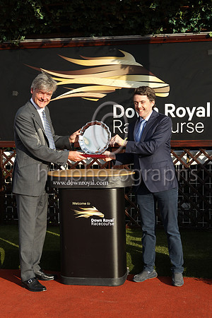 Gawn Rowan-Hamilton Lord Lieutenant of County Down presenting Her Majesty's Plate to Chris Armstrong representing the owners of Perotan winner of Her Majesty's Plate (Listed Race) at Down Royal on 22n