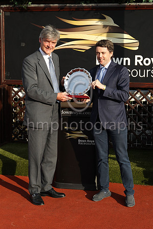 Gawn Rowan-Hamilton Lord Lieutenant of County Down presenting Her Majesty's Plate to Chris Armstrong representing the owners of Perotan winner of Her Majesty's Plate (Listed Race) at Down Royal on 22n