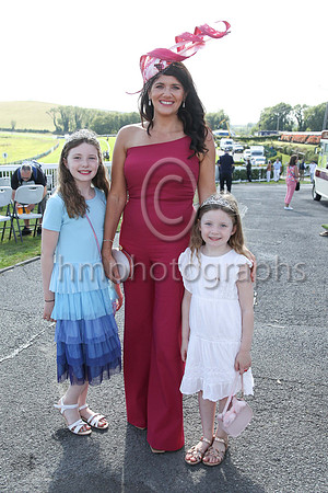 Amelia, Nuala and Rosa Perry from Downpatrick at the Downpatrick Racecourse Ladies Day on Monday