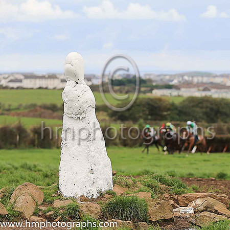 Horses at the Route Point-To-Point Steeplechases at Portrush pass the The White Wife, an ancient stone. <br/><br/>http://www.irishmegaliths.org.uk/derry.htm
