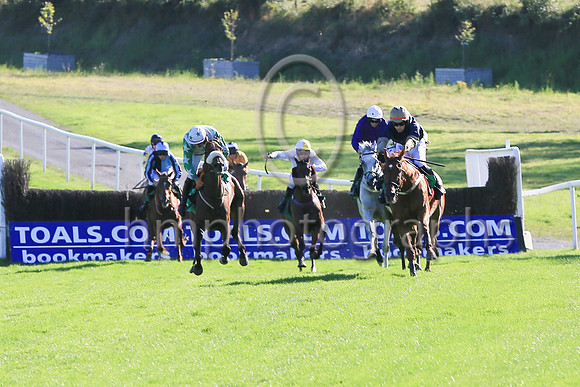 Shantou Sisu and Danny Mullins (dark blue, orange sleeves) winners of Race 6 The Downpatrick Handicap Steeplechase