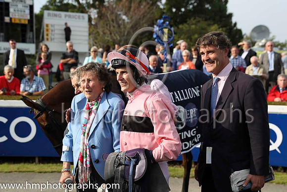 01 Toe The Line and F M Berry - - 01st (9 ,pink, black hoop ) Trainer - J E Keily