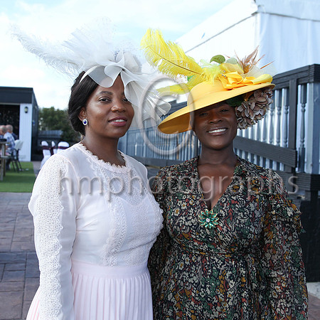 Thembie Hadebe and Percy Sikhosana from Belfast at the Downpatrick Racecourse Ladies Day on Monday