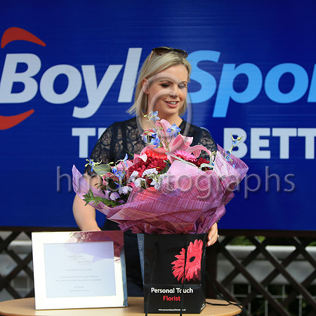 Jenna Boyle with presentation flowers at the Boylesports Ulster Derby Day at Down Royal on 18th June 2022