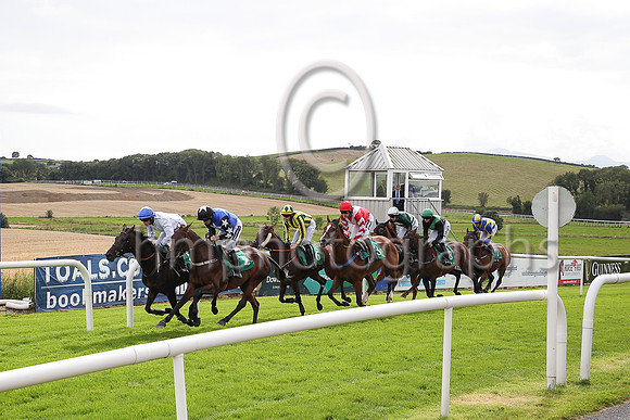 Crossing the line for the first circuit 01st Sharlanda and S W Flanagan ( 3 , red, white chevron ) Trainer - C Bowe , Owner - Thomas F Hughes
