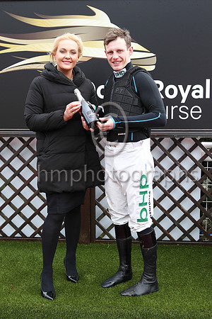 Emma Meehan , Manager of Dowm Royal presenting a bottle of champagne to Gold Cup winning jockey Paul Townend at Down Royal