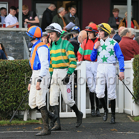 Jockeys enter the parade ring for the Racing TV Handicap Steeplechase at Downpatrick