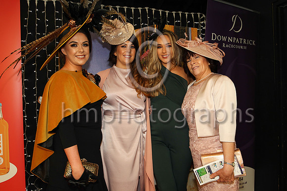 Sisters Clare Murnin (finalist in the WKD Most appropiately dressed lady competion), Laura Brennan, Michael McAvoy with their mum Winnie McAvoy from Newcastle at Downpatrick Races