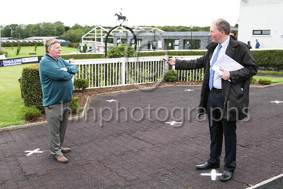 Sean McParlan trainer of winner Walkers Point being interviewed by Michael Graham