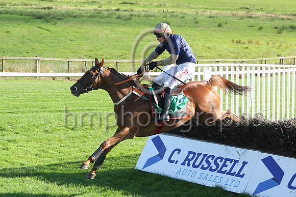 Shantou Sisu and Danny Mullins (dark blue, orange sleeves) winners of Race 6 The Downpatrick Handicap Steeplechase