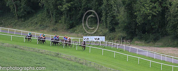 Racing down the hill at The Family Fun Raceday at Downpatrick Race Course on Wednesday 13th July 2022.