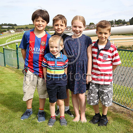 Leo Fennell, Fionn Fennell, Emer Hanna and Caollfhionn Hanna and Louhlainn Hanna in front enjoying themselves at the Keep It Country Raceday and Concert at Downpatrick Races