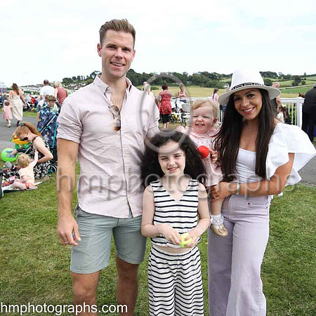Gerdie Collins, Lucy Hamill, Clara Kerr and Saorlaith Collins form Downpatrick at The Family Fun Raceday at Downpatrick Race Course on Wednesday 13th July 2022.
