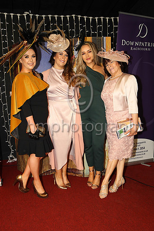 Sisters Clare Murnin (finalist in the WKD Most appropiately dressed lady competion), Laura Brennan, Michael McAvoy with their mum Winnie McAvoy from Newcastle at Downpatrick Races