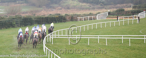 Horses in race 5 approach the second fence at the Boxing Day meeting at Down Royal in 2014