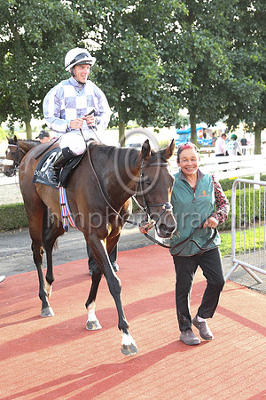 Hazel Galloway leads Perotan winner of Her Majesty's Plate (Listed Race) into the winners's enclosure at Down Royal on 22nd July 2022