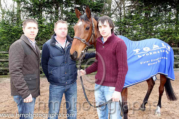 Colm McDonnell, with brothers Conor & Chris, owner of Hidden Horizons winner of the Toals bookmakers Ulster Grand National at Downpatrick - CU2D1438-Edit-23