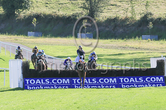 Shantou Sisu and Danny Mullins (dark blue, orange sleeves) winners of Race 6 The Downpatrick Handicap Steeplechase