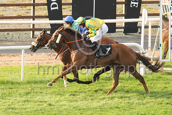 New Sodiety and Sorcha Woods (1, royal blue, emerald green chevron ) in the lead to win the Molson Coors Beverage Company Apprentice Handicap at Down Royal on Friday 23rd July 2021