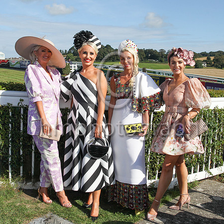 Catherine O'Connor from Camlough, Shileen McConville from Lurgan, Sinead McKenna from County Meath and Victoria Lavery from Lurgan at Ladies Day at Downpatrick Racecourse on Monday