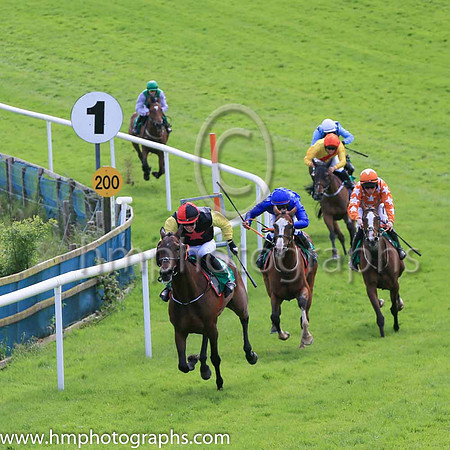 Lieutenant Highway(3, Black Red Star, Yellow Sleeces) ridden by Corey McGivern in the lead before goung on the win Race 5 at Downpatrick Races on 12th June 2022